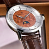 Pagani Design Copper Moon watch with a moon phase dial on a brown leather strap
