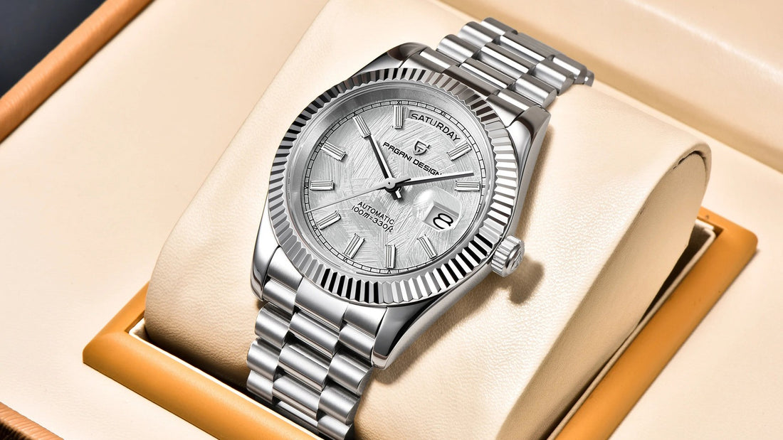 Silver Pagani Design automatic watch with stainless steel bracelet resting in its presentation box