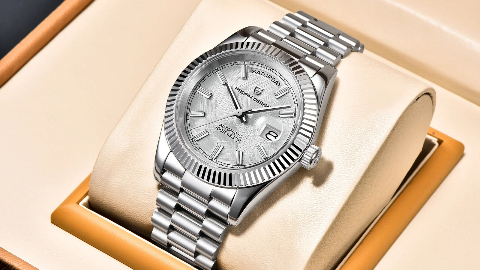 Silver Pagani Design automatic watch with stainless steel bracelet resting in its presentation box