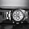 Side profile of the white-dial Apex Chronograph by Pagani Design showing the case and bracelet links