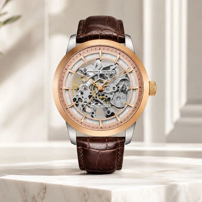 Artisan rose gold skeleton watch with brown leather strap