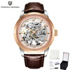 Rose gold Artisan Open Dial by Pagani Design on a brown strap, shown with its gift box and warranty card