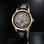 Rose gold Artisan Open Dial by Pagani Design angled on a dark reflective surface, movement visible through the dial