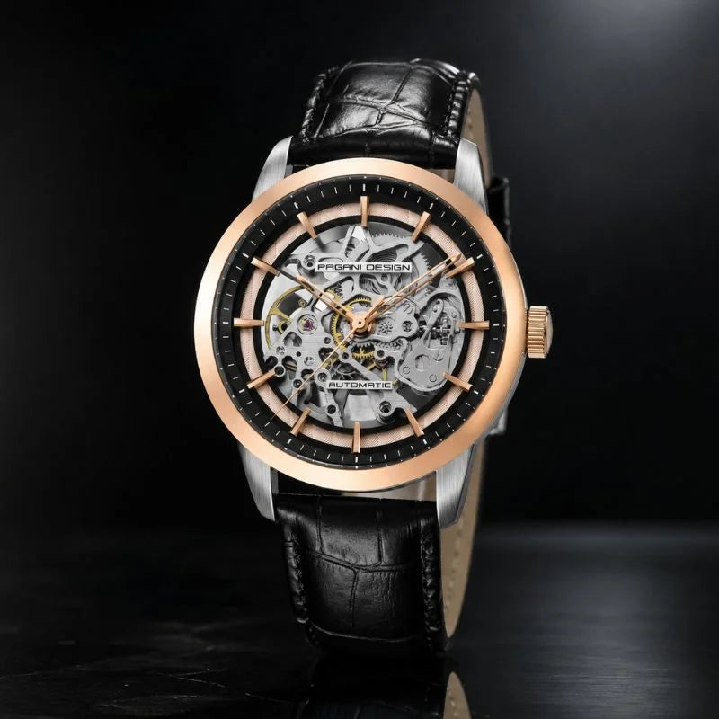 Rose gold Artisan Open Dial by Pagani Design angled on a dark reflective surface, movement visible through the dial