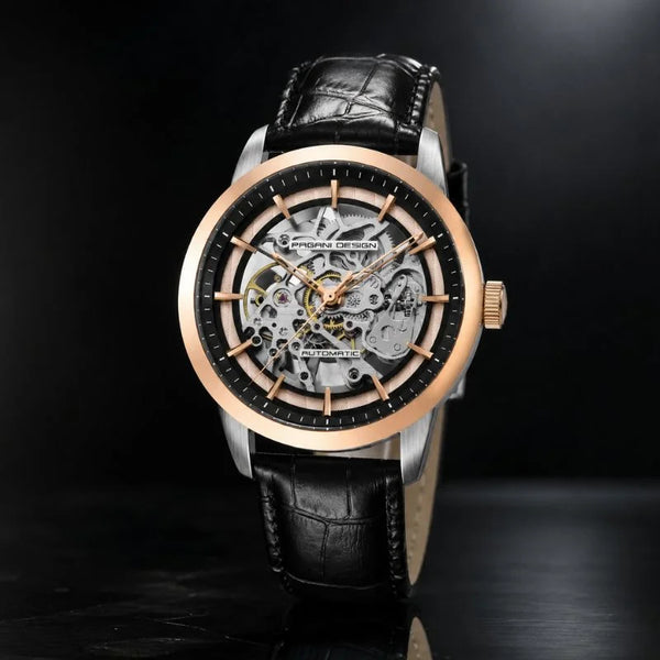Rose gold Artisan Open Dial by Pagani Design angled on a dark reflective surface, movement visible through the dial