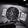 Aureon watch by Pagani Design with the bracelet opened on a glossy black surface