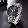 Aureon watch by Pagani Design angled on a dark surface with its reflection