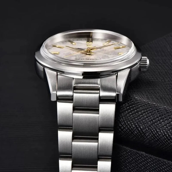 White-dial Aurum Frost by Pagani Design angled on dark textured fabric