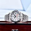 Explorer GMT by Pagani Design resting on a wooden box against a pale blue backdrop