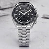 Lunarsteel chronograph by Pagani Design standing on a grey rock surface