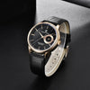 Midnight Elegant de oro rosa de Pagani Design inclinado sobre una superficie gris oscuro