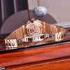 Engraved caseback of the Rose Horizon by Pagani Design resting on a polished wooden ledge
