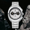 White-dial Sterling Chrono by Pagani Design photographed among dark rocks