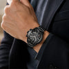 Man in a dark blazer wearing the all-black Urban Motion chronograph by Pagani Design