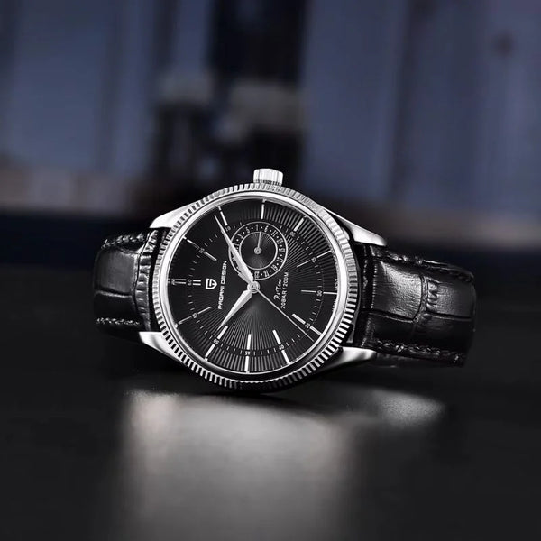 Steel Vanguard Classic with black dial by Pagani Design on a dark desk