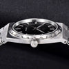 Side view of the steel Royal Slim Sapphire case and crown by Pagani Design